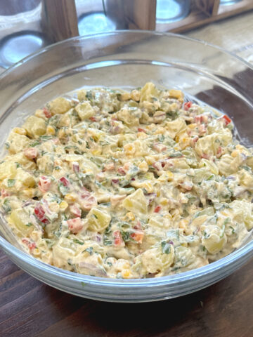Southwestern potato salad in a glass serving bowl