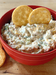 million dollar dip in red bowl with crackers