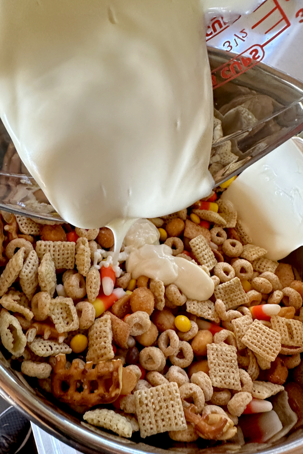 white chocolate pouring a snack mix