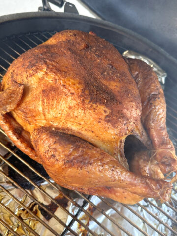 whole turkey in a smoker