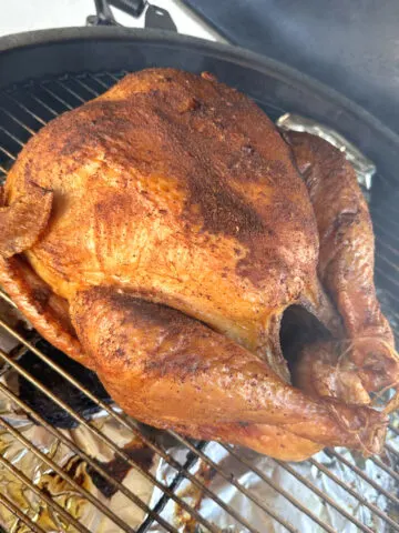 whole turkey in a smoker