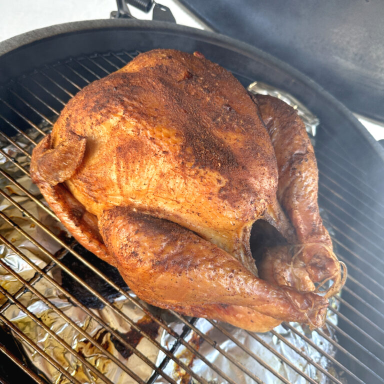 whole turkey in a smoker
