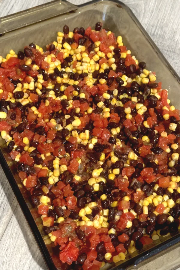 Mexican casserole ingredients mixed together 