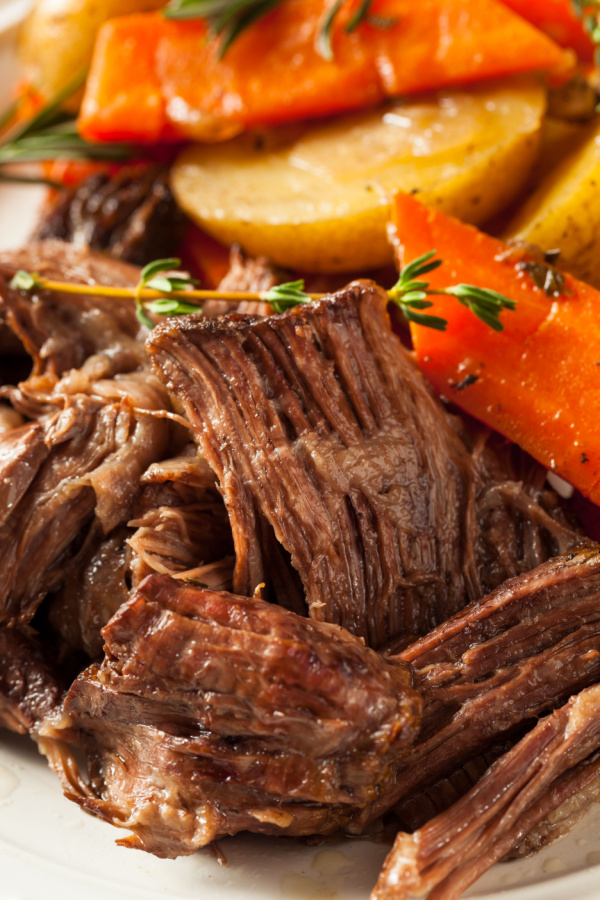 shredded chuck roast and cooked carrots and potatoes