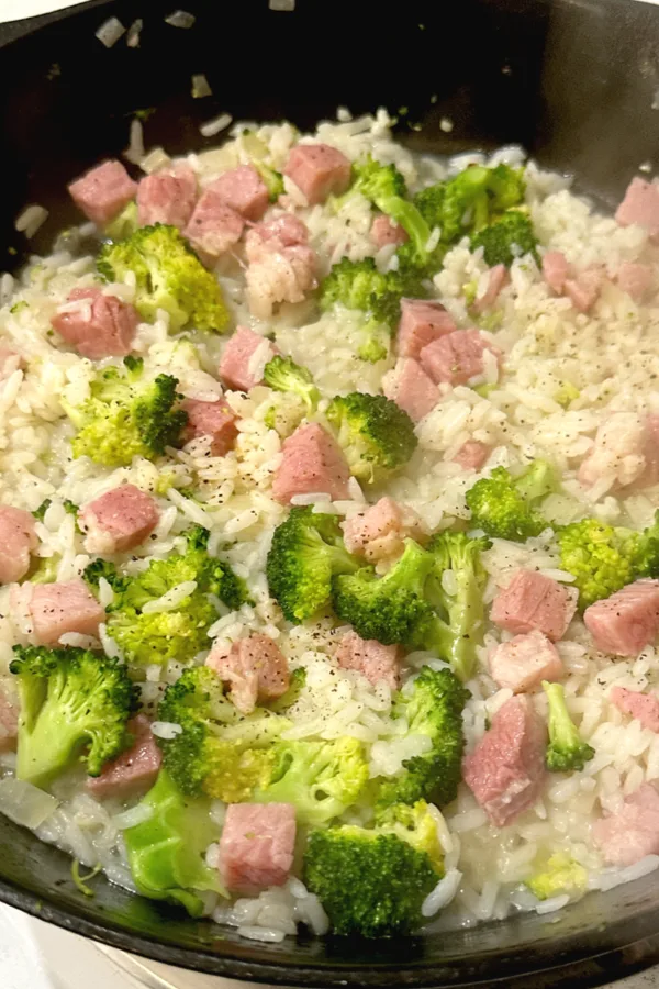 leftover ham rice and broccoli in a skillet 