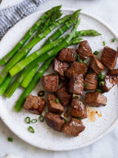 marinated steak bites and asparagus