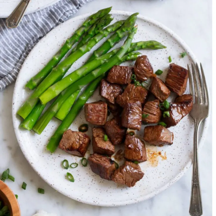 marinated steak bites and asparagus