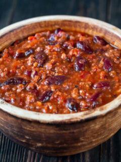 stove top chili in a wooden bowl