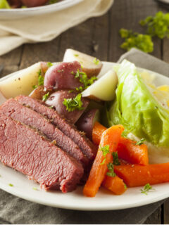 crock pot corned beef and cabbage dinner on plate