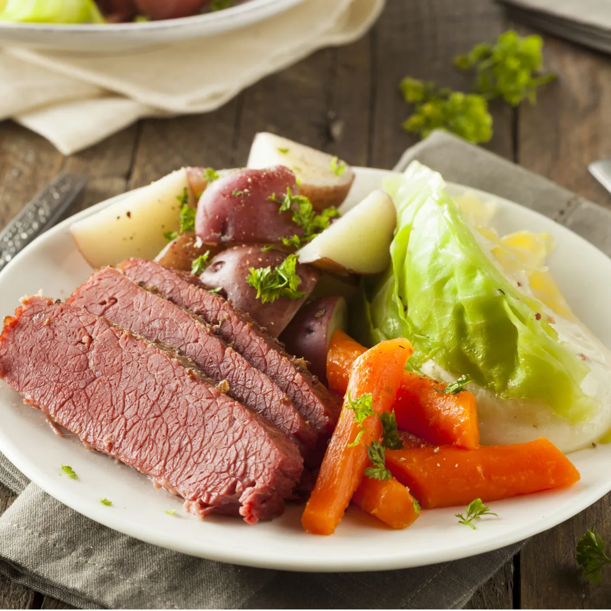crock pot corned beef and cabbage dinner on plate