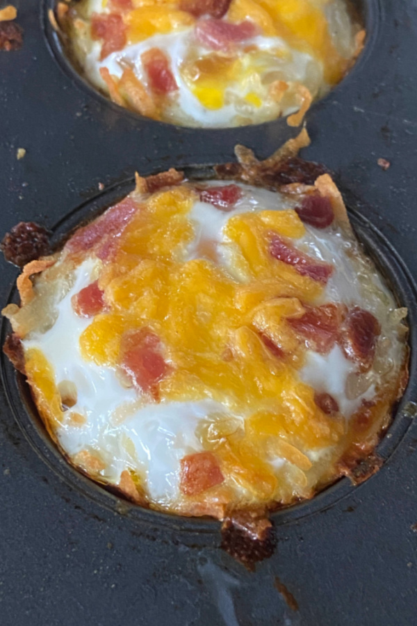 cooked hash brown egg nest in muffin tin