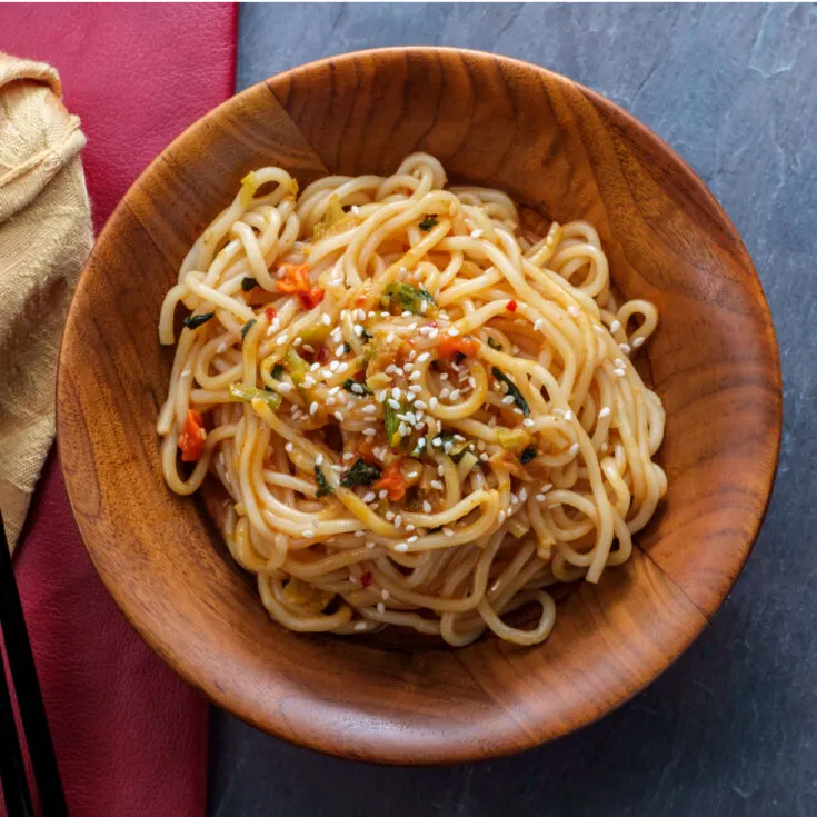 Vegetable Lo Mein topped with sesame seeds.