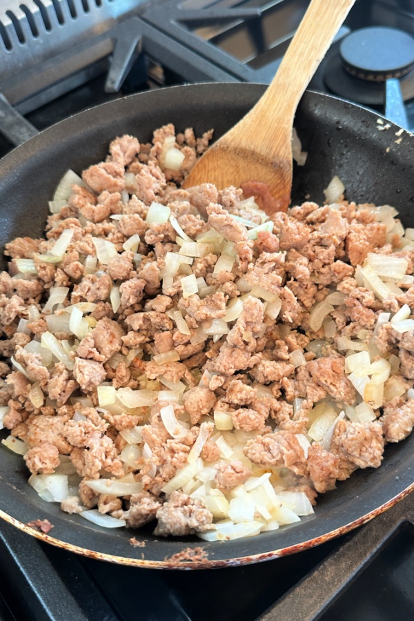 sausage and onions in skillet