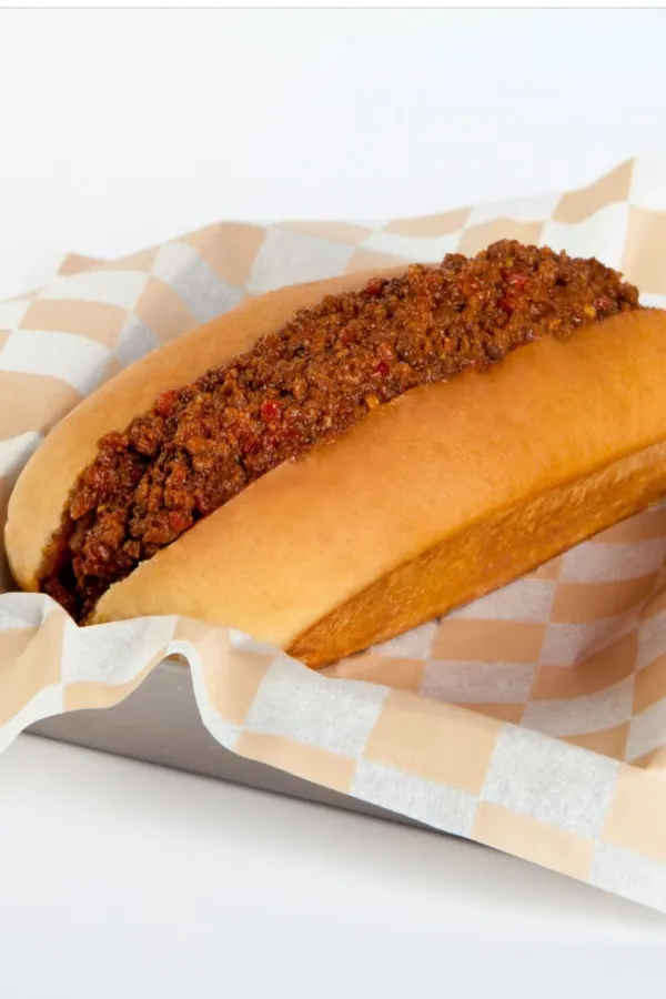 hot dog with meat sauce on top