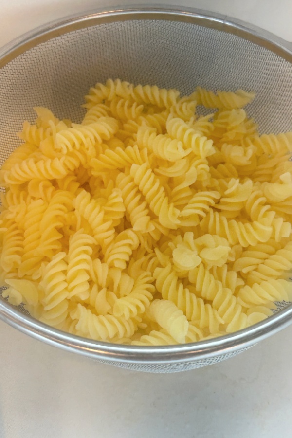 rotini pasta in strainer