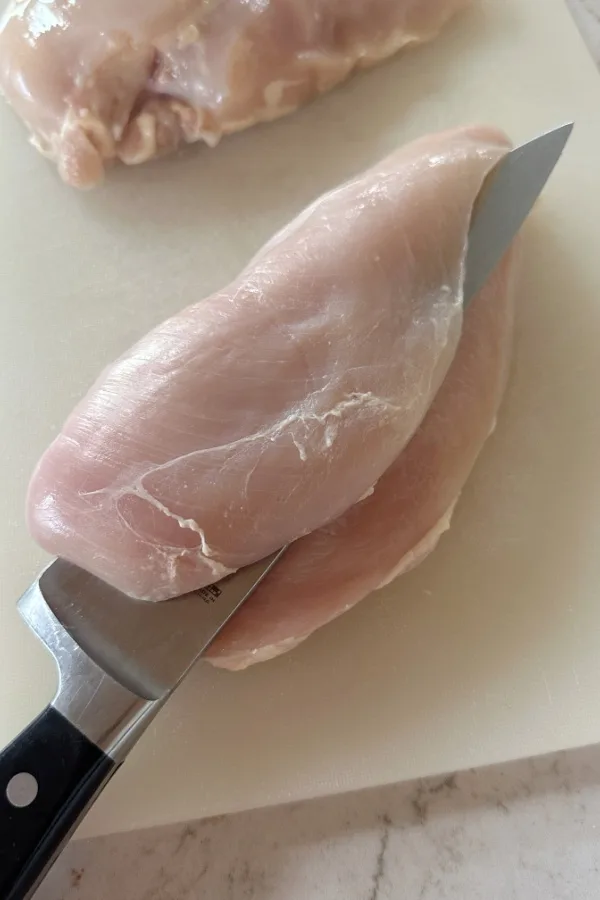 cut chicken breast in half 
