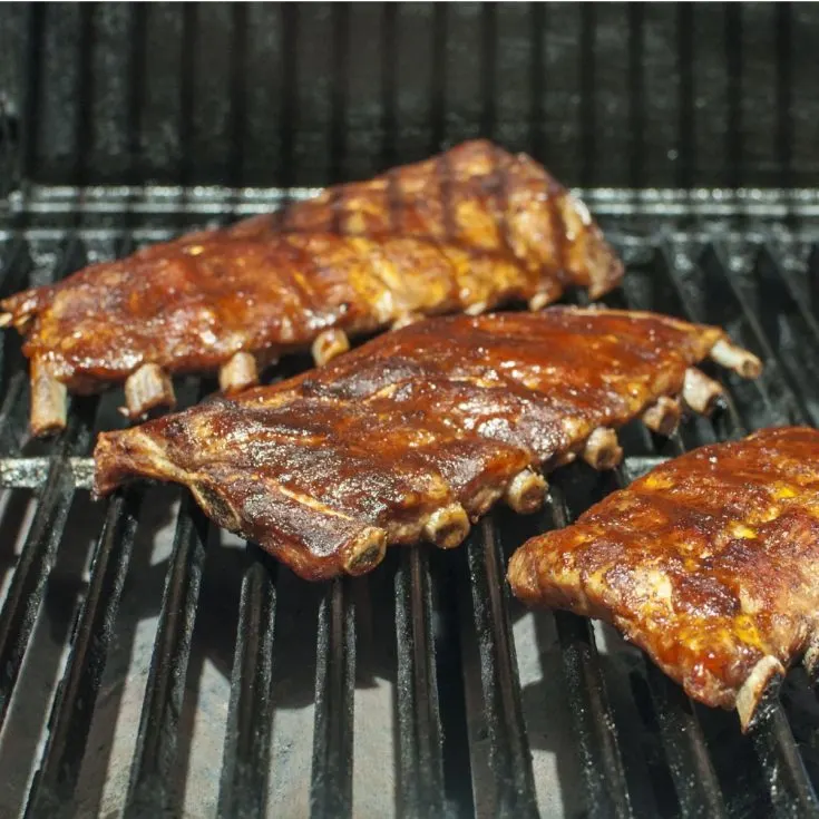 smoked baby back ribs on grill