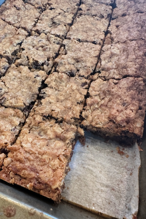 cutting oatmeal chocolate chip cookie bars 