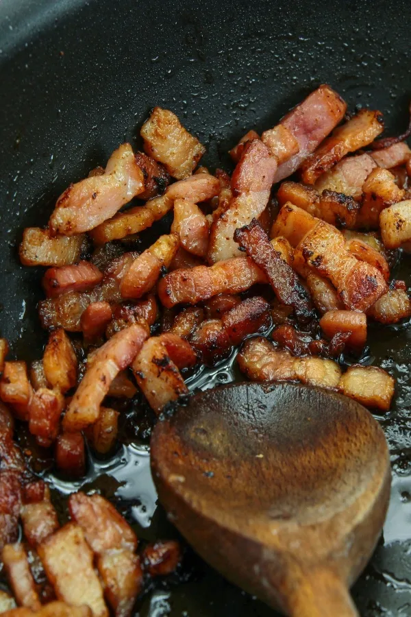 cooking bits of bacon