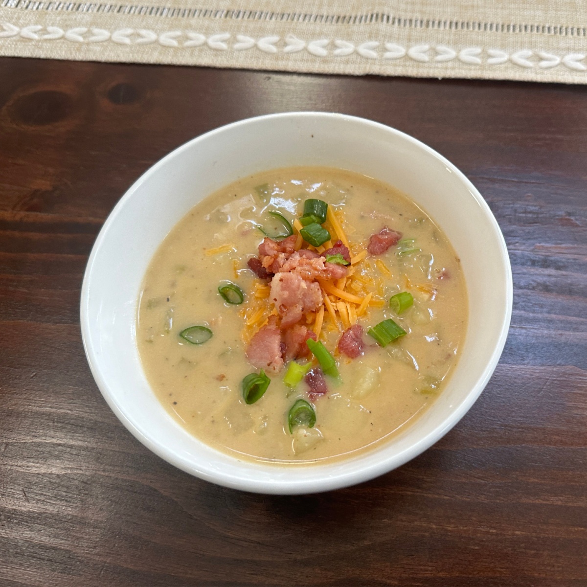 bowl of stove top cheesy potato soup