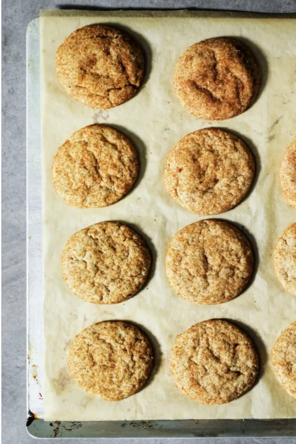 snickerdoodle cookies on parchment paper