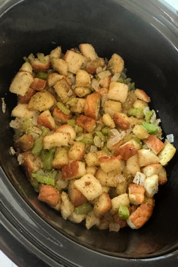 crock pot dressing ready to be cooked