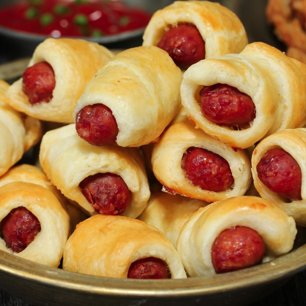 mini pigs in a blanket
