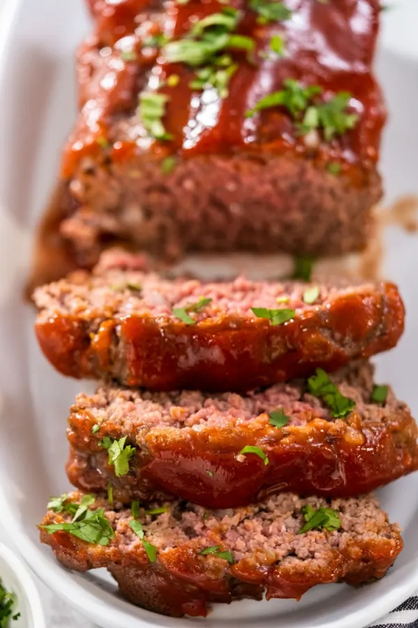 slicing meatloaf that was made in a crock pot 