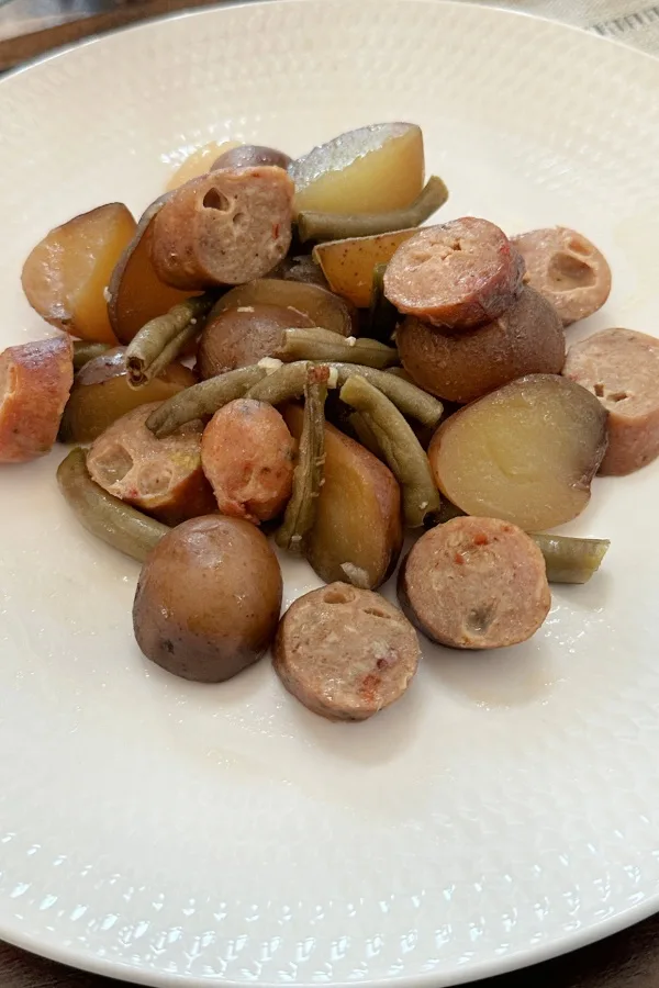 sausage green beans and potatoes on a plate