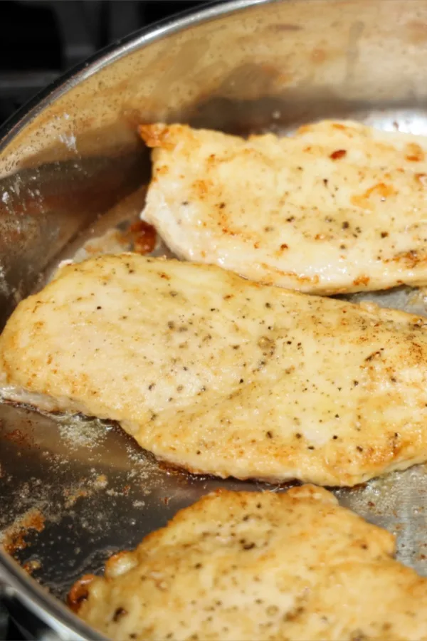 white meat in frying pan