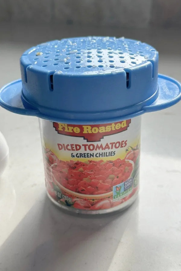 draining cap on canned tomatoes